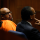 Former rap mogul Marion “Suge” Knight, left with his defense attorney Albert DeBlanc Jr., pleads no contest to voluntary manslaughter Sept. 20, 2018, in Los Angeles Superior Court.